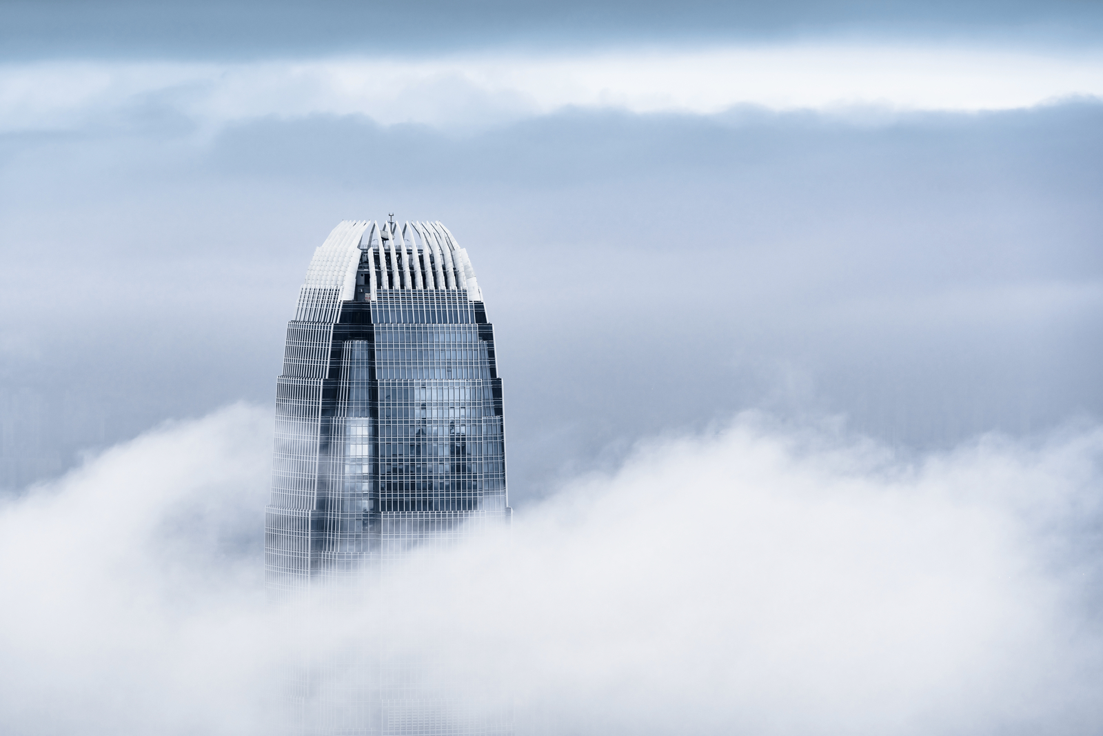 Skyscraper amidst the fog in Hong Kong.